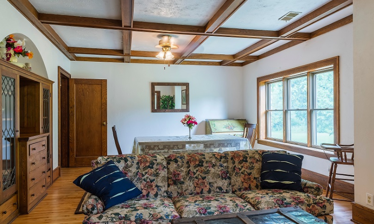 A living room with a couch and table